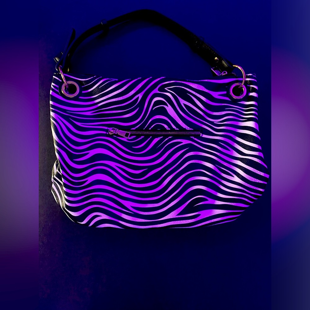 Brand new zebra purse bag. No name brand. Multiple compartments